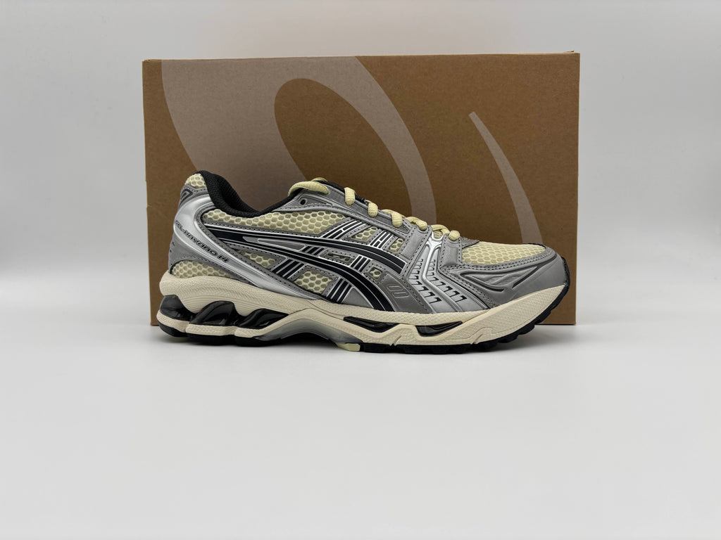 Side view of ASICS Gel-Kayano 14 Oyster White Steeple Grey running shoe – retro ASICS sneaker with mesh and layered overlays.
