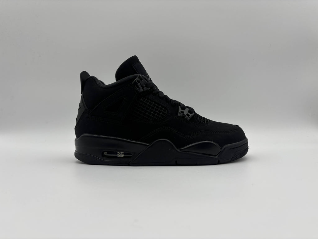 Side view of Air Jordan 4 Retro Black Cat 2025 GS sneakers with iconic high-top design, all-black nubuck upper, mesh paneling, and visible Air cushioning for basketball performance and streetwear style
