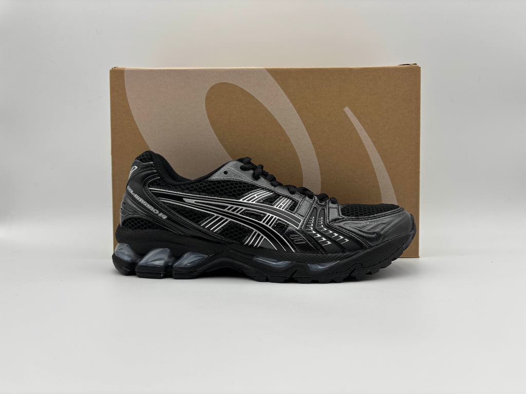 ASICS Gel-Kayano 14 Black Pure Silver brand new running shoe displayed in front of box
