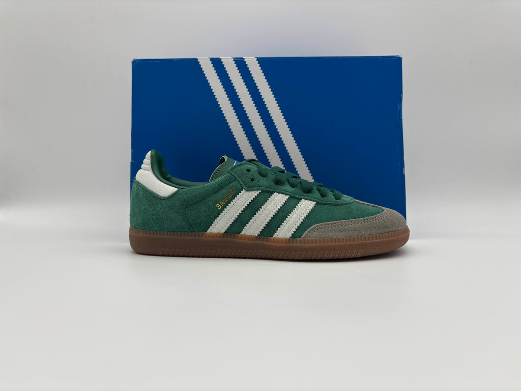 Side view of Adidas Samba OG Collegiate Green Gum Grey Toe sneakers with classic leather upper, green accents, grey toe panel, and gum rubber sole for retro soccer-inspired style and casual wear.
